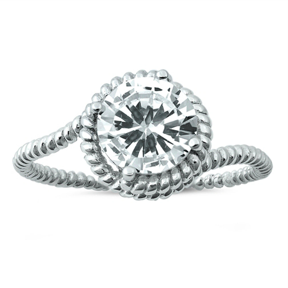 A generously sized 2.5 ct. round cut solitaire ring fits inside this charming rope setting, suitable for her inner cowgirl or fashion queen.