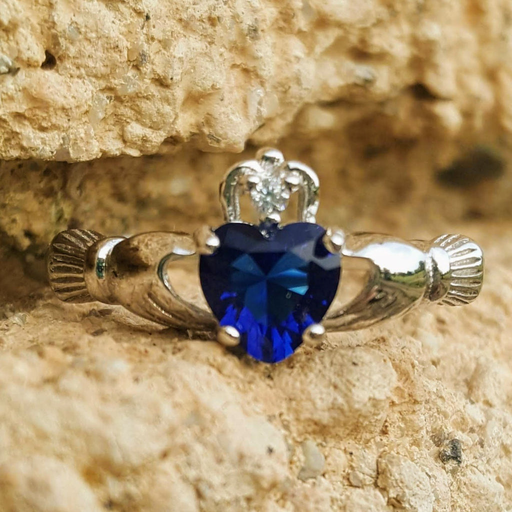 Blue sapphire claddagh ring in silver 