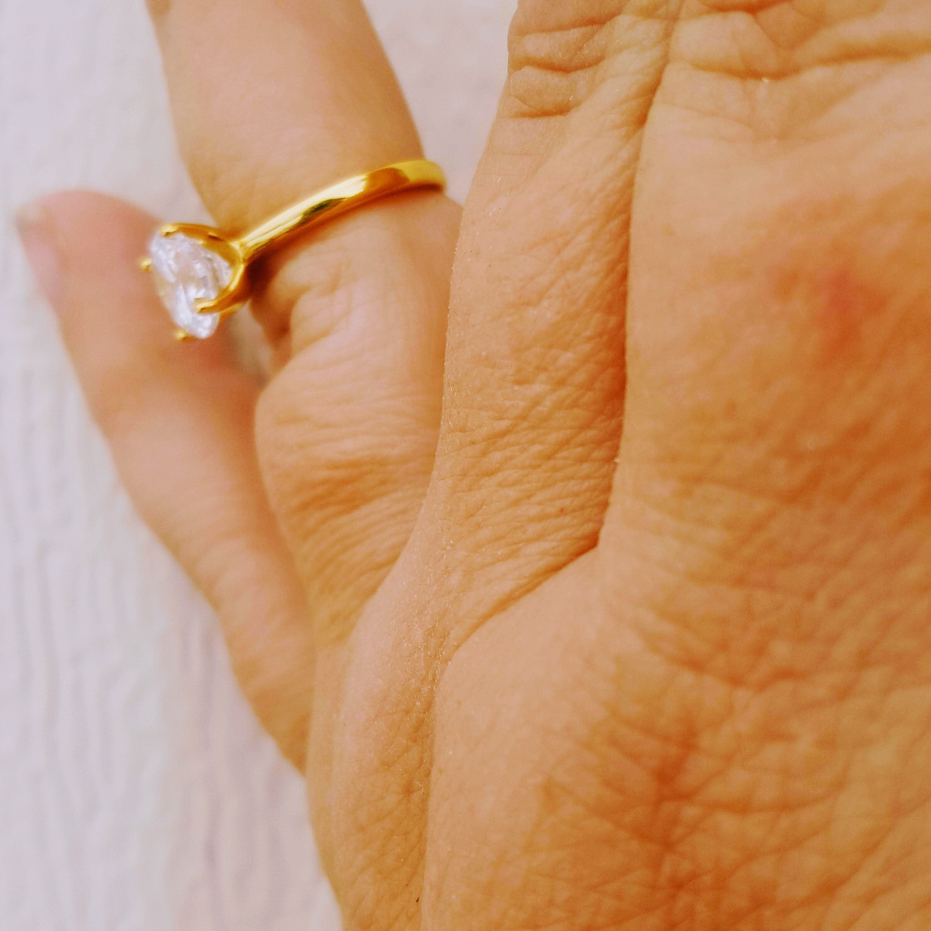 Yellow Gold ladies bridal ring 4 prongs side view on finger