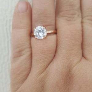 2 carat Rose Gold Wedding Ring on finger