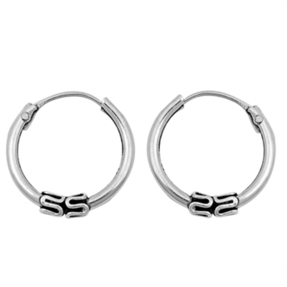 Silver continuous hoop swirl earrings