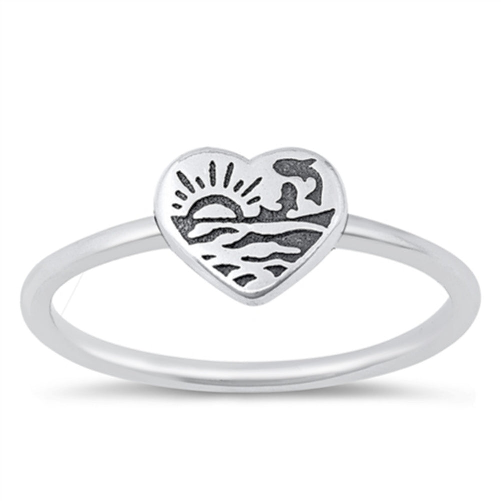 Silver ocean waves and dolphin heart ring