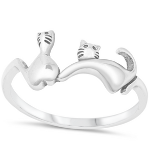 two cats playing ring
