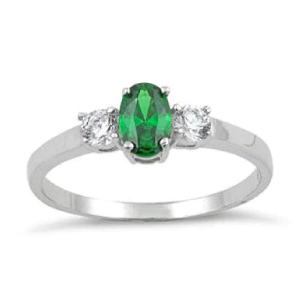 Silver emerald three stone ring