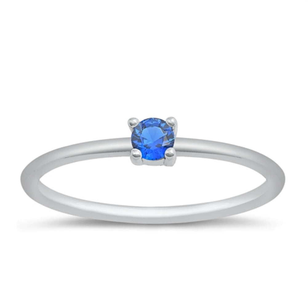 Tiny blue sapphire ring