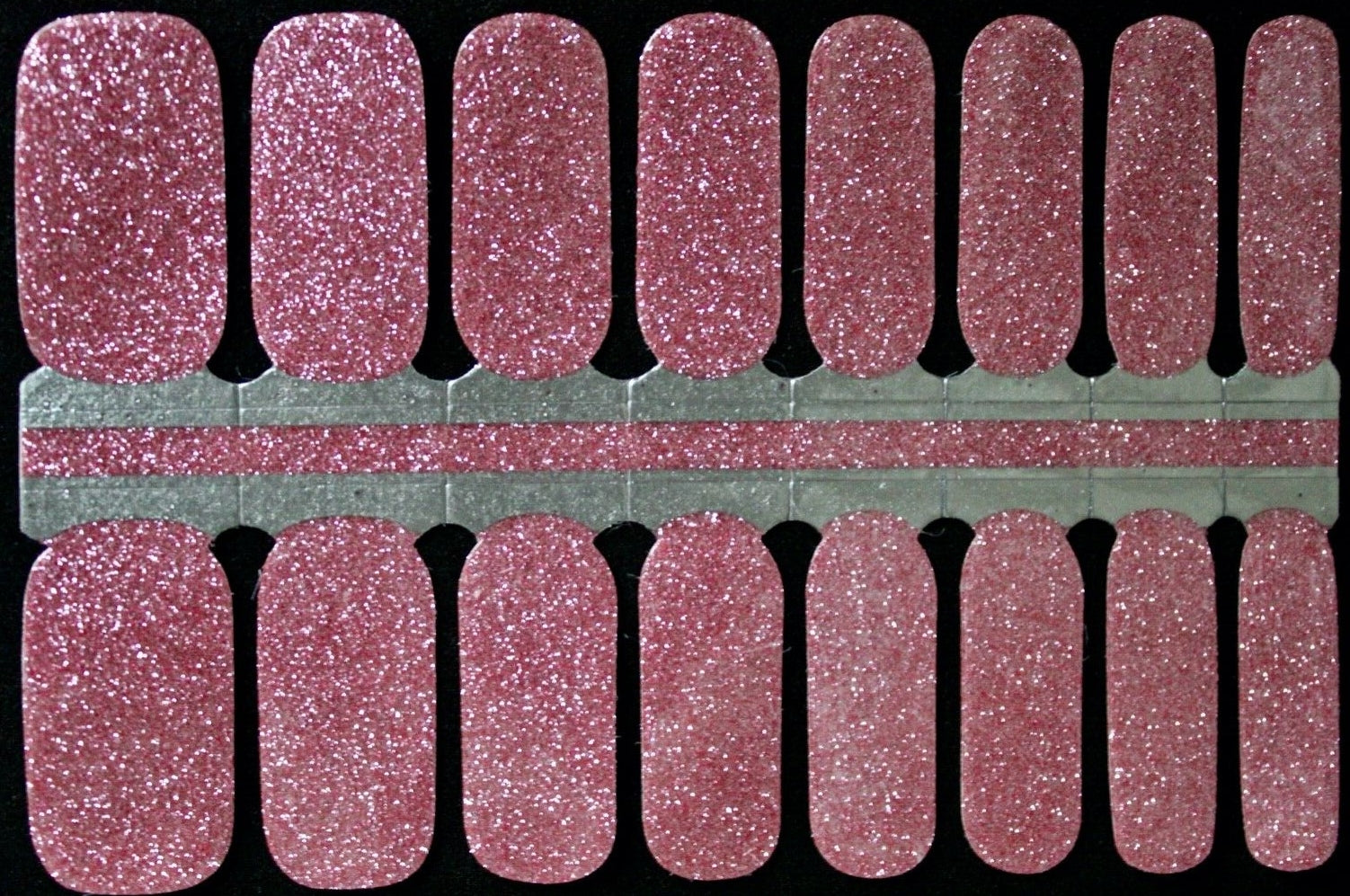 Pink glitter manicure nail polish lacquer strips
